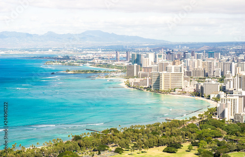 Panorama skyline view of Honolulu city and Waikiki beach in the pacific island of Oahu in Hawaii - Postcard from Diamond Head crater of exclusive travel destination - Warm day filter