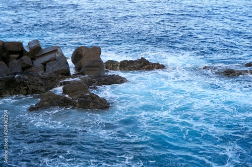 rocks in the blue sea