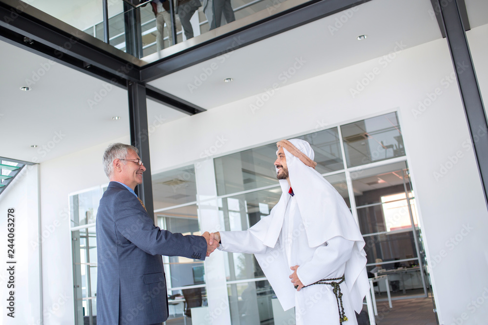Businessman handshake with Arabian partner
