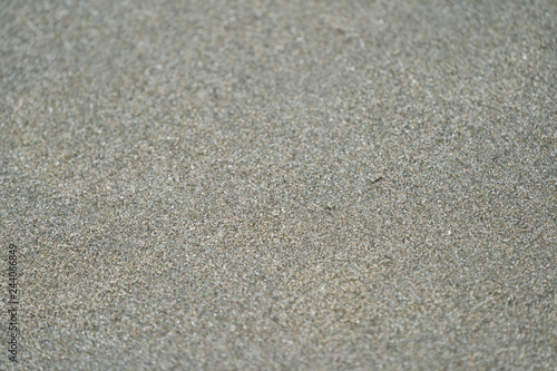 Close up / macro dark brown and black sand.