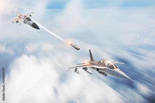 Obraz na plátne Combat fighter launches missiles at a target - another fighter jet