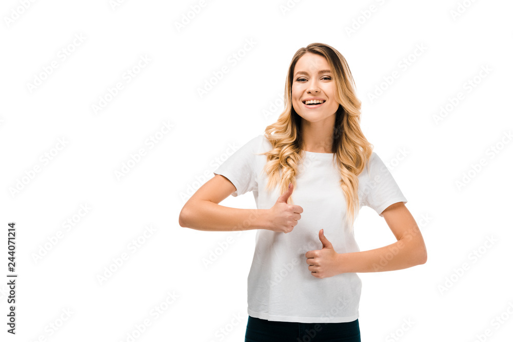 happy blonde girls showing thumbs up and smiling at camera isolated on white happy blonde girls showing thumbs up and smiling at camera isolated on white