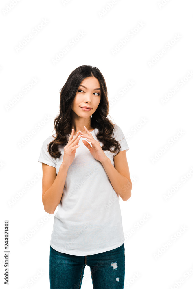 beautiful smiling girl in white t-shirt standing and looking away isolated on white beautiful smiling girl in white t-shirt standing and looking away isolated on white
