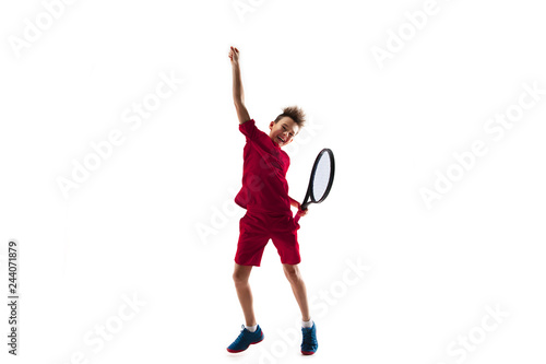 Young teen boy tennis player in motion or movement isolated on white studio background. The sport, exercise, training concept