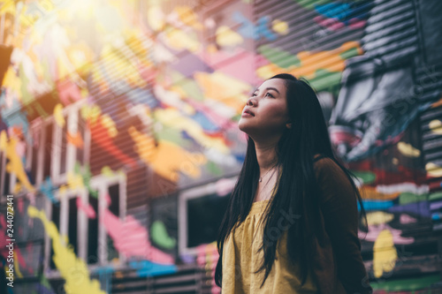 Young pretty hipster asian woman
