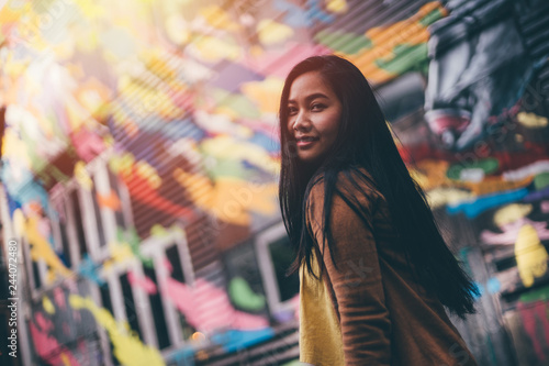 Young pretty hipster asian woman