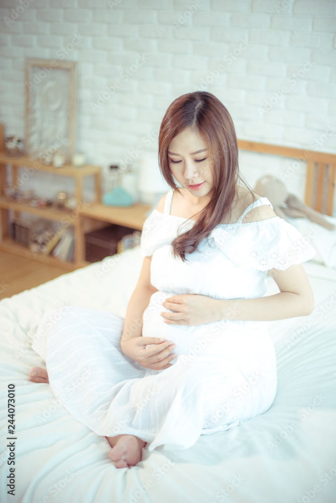 Attractive pregnant asian woman Attractive pregnant asian woman