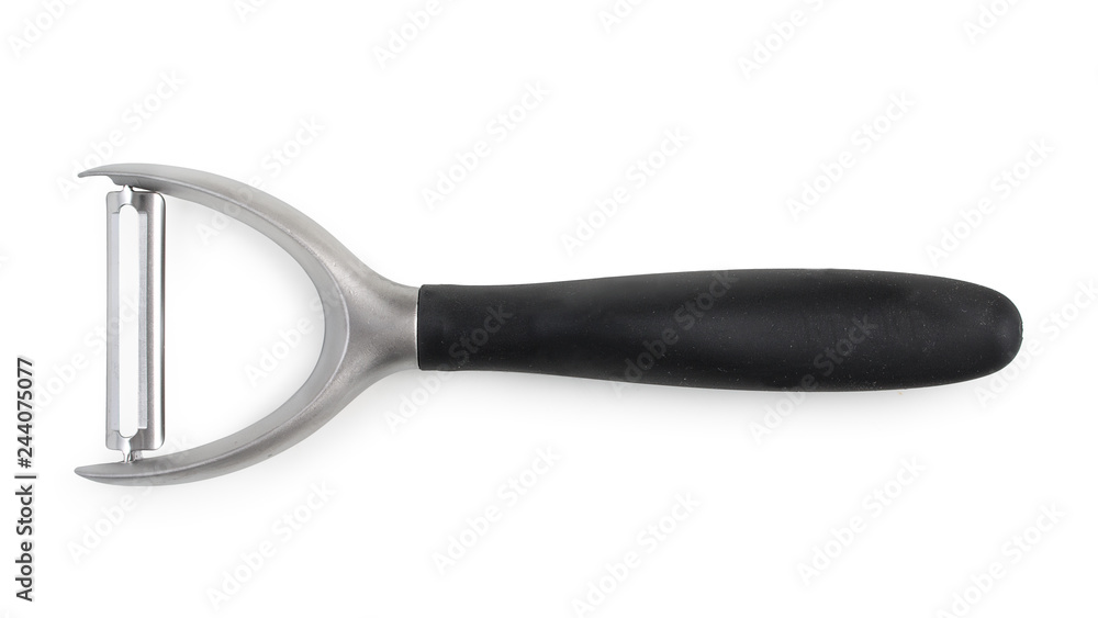 Vegetable peeler. Isolated on white background, top view, close up. Vegetable peeler. Isolated on white background, top view, close up.