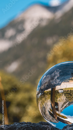 Smartphone HD wallpaper of crystal ball alpine landscape shot at the big maple ground Hinterriss - Austria © Martin Erdniss