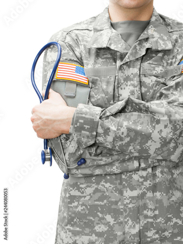 US Army doctor holding stethoscope next to his shoulder