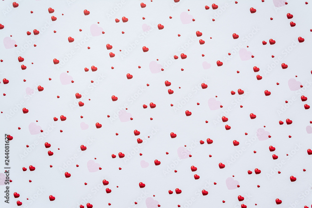 Abstract valentine's day background with red heart symbols on white background