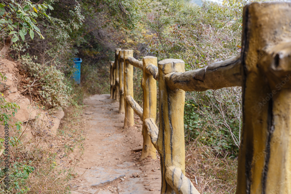 Trail in the mountains with a fence, Henan Province China