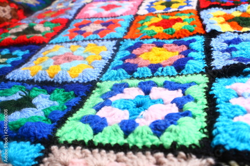 Multicolored handmade plaid of crochet made of granny squares