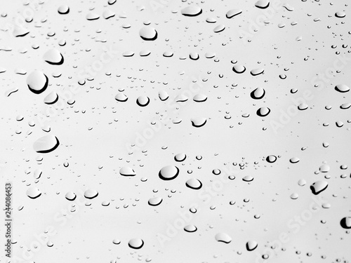 closeup drops water on glass background