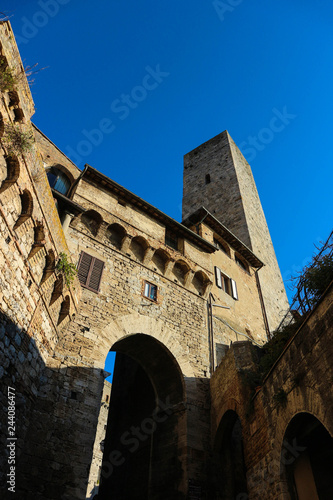 Arco dei Becci (arch of becci) and torre dei becci (tower of becci family), San Gimignano. Tuscany, Italy photo