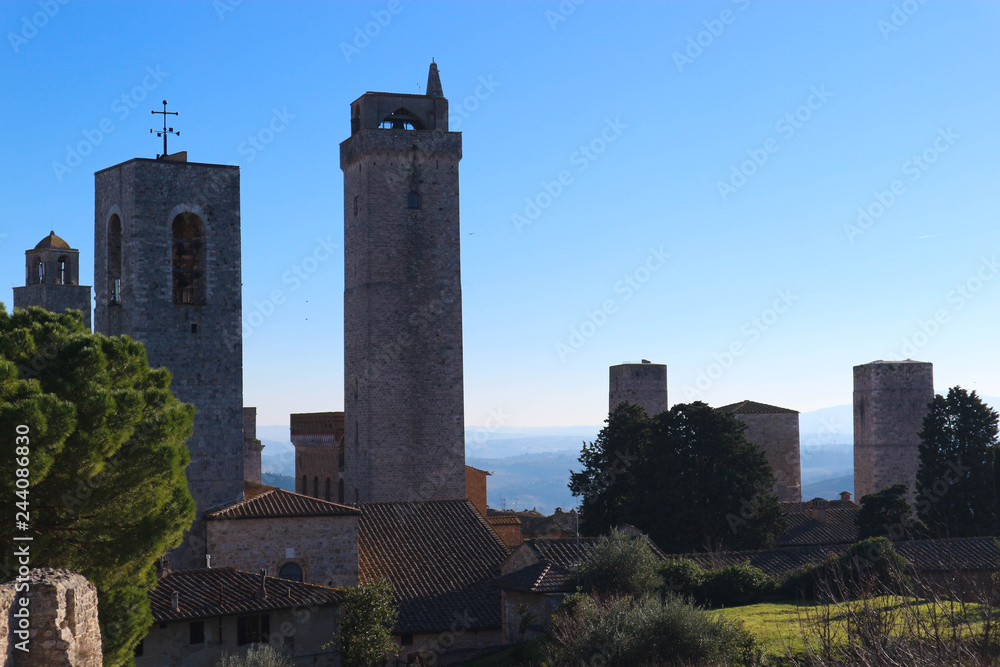 Medieval towers of San Gimignano against blue sky, Tuscany, Italy