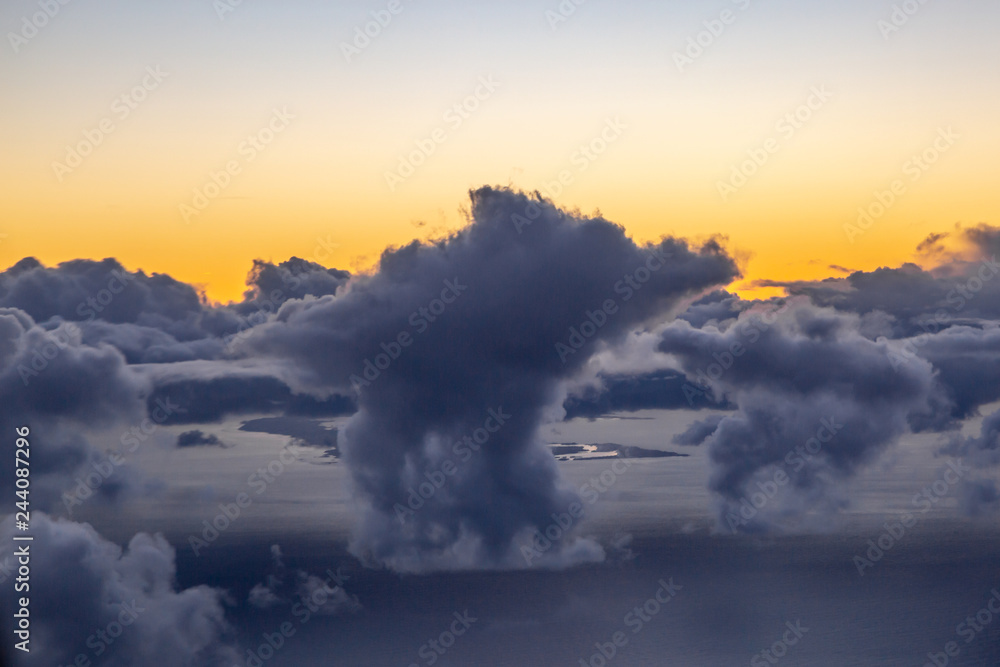An Aerial View of Clouds and Sunset over the Ocean