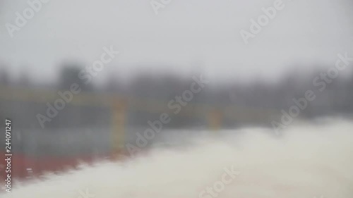 Great Pyrenees dog plays with another dog. Beautiful winter. Runs a lot. There is a different video. Вogs play, dogs run, look, strats. Pedigree dog. Big and beautiful.