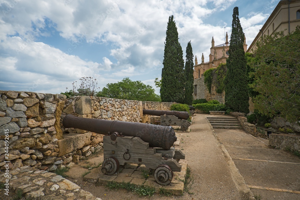 Old guns in Tarragona Passeig arqueologic (Archaeological Promenade) under Roman era walls