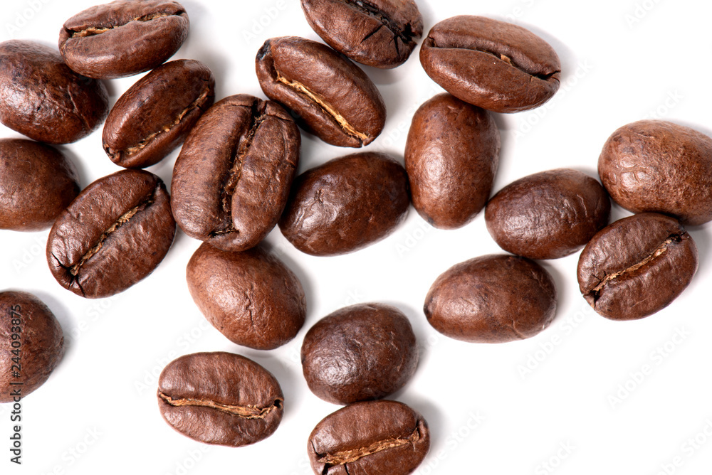 close-up of coffee beans on white background, top view close-up of coffee beans on white background, top view