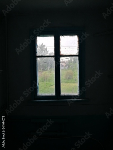 A window in a dark room