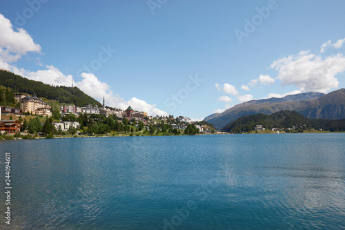 Sankt Moritz town and lake, wide angle view in a sunny summer day in Switzerland