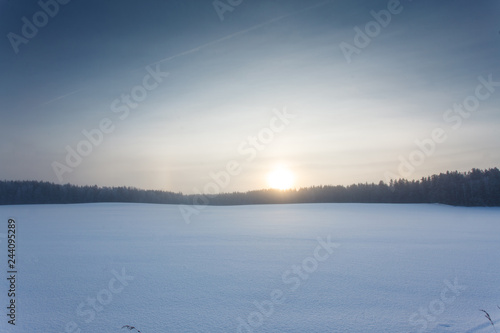 Winter landscape at sunrise