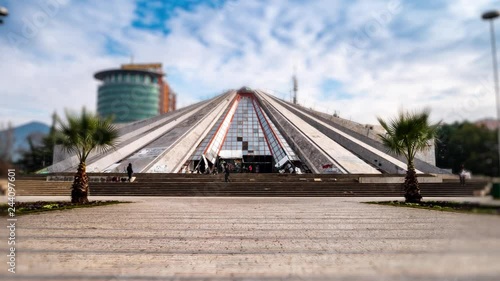 Tirana, Albania:  time lapse of the Pyramid of Tirana, a structure and a former museum located in Tirana built by the communist dictator Enver Hoxa photo