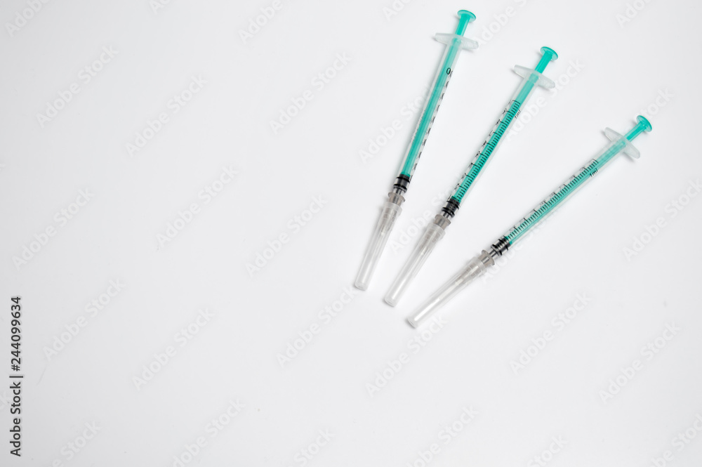 Insulin syringes on a white background, diabetic, vaccination, injection, automatic