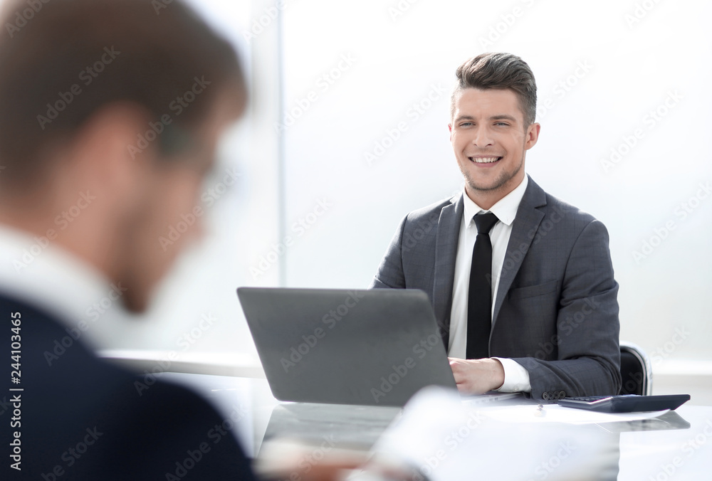 Two businessmen at work in office Two businessmen at work in office