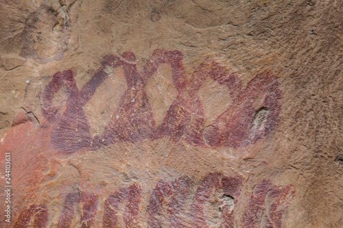 Prehistoric paintings on rock known as petroglyphs in the municipality of Facatativa in Colombia photo