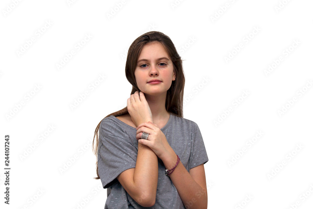 blue eyed brown haired shy girl with flowing hair. Isolated studio model shot. blue eyed brown haired shy girl with flowing hair. Isolated studio model shot.