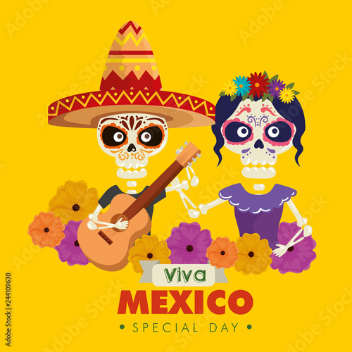 catrina and skeleton man wearing hat with guitar and flowers
