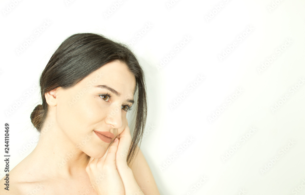Smiling beautiful young woman with clean and healthy skin Smiling beautiful young woman with clean and healthy skin
