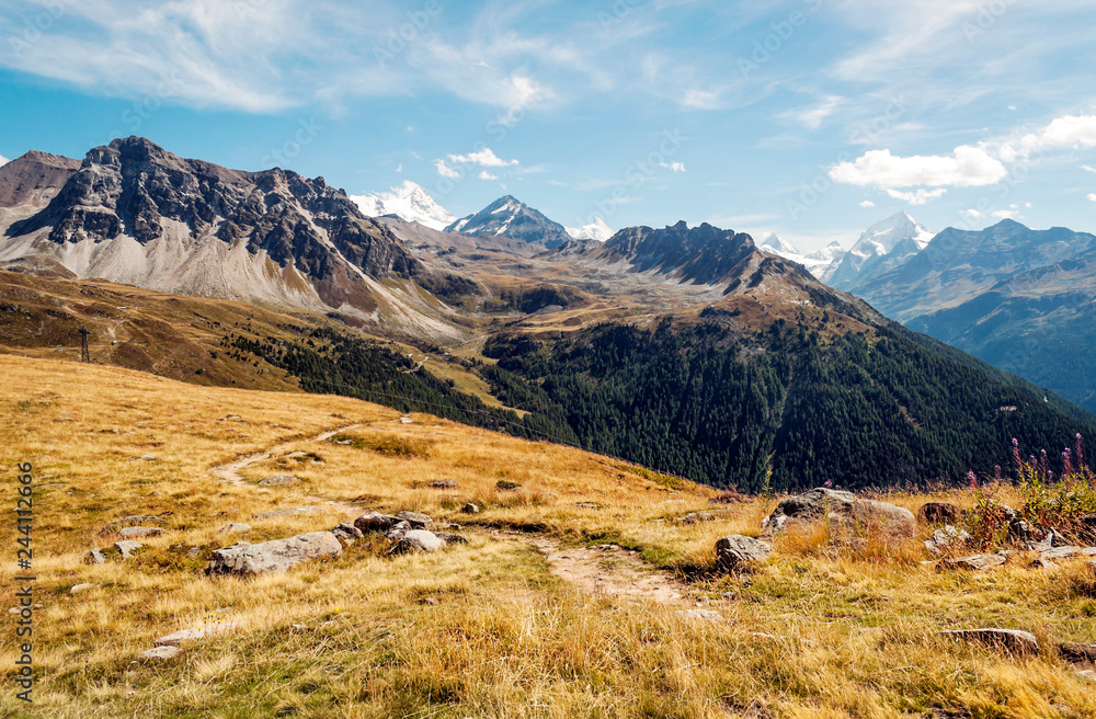 Mountains of the Swiss Alps in the Saint Luc valley on a sunny day.