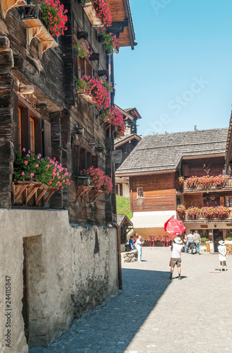 Streets with wooden houses in Grimentz