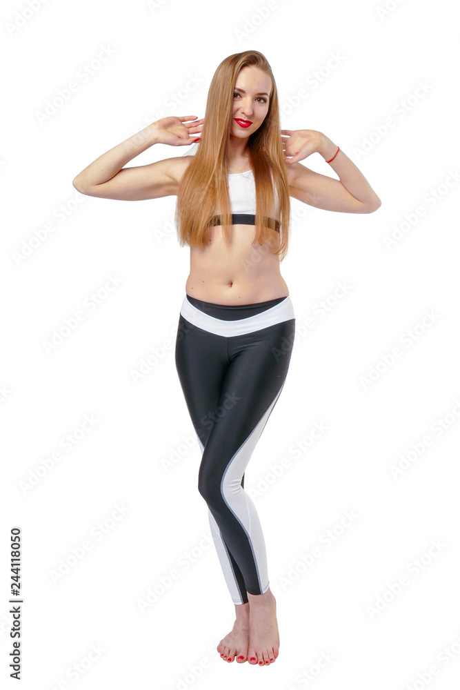 Young attractive woman posing in fitnes wear Young attractive woman posing in fitnes wear