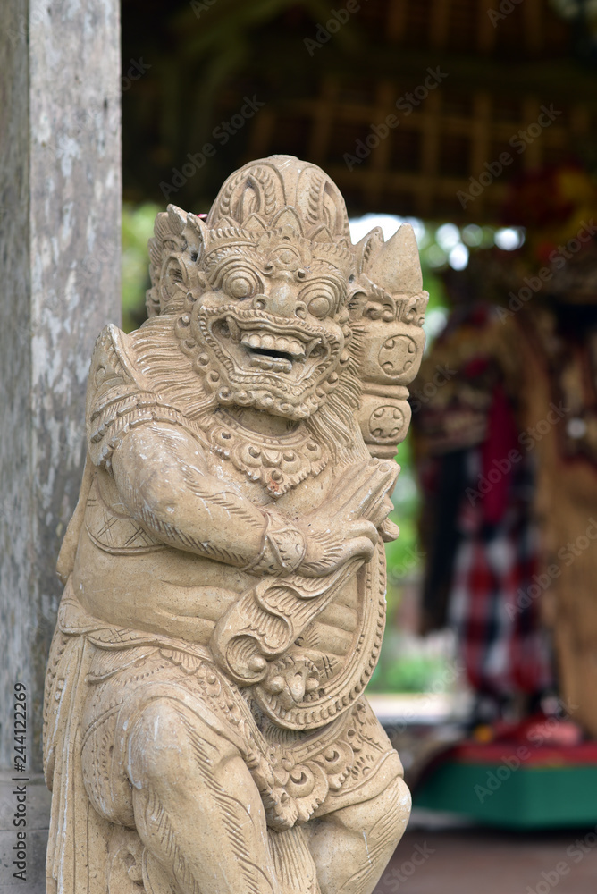 Hindu stone statue at Taman Ayun Temple in Ubud, Bali Island, Indonesia