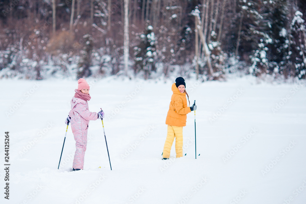 Child skiing in the mountains. Winter sport for kids. Child skiing in the mountains. Winter sport for kids.
