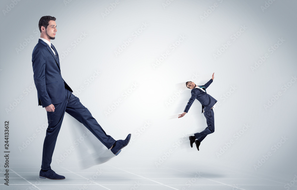 Young businessman fired cruel and aggressive by his boss with white background
Young businessman fired cruel and aggressive by his boss with white background