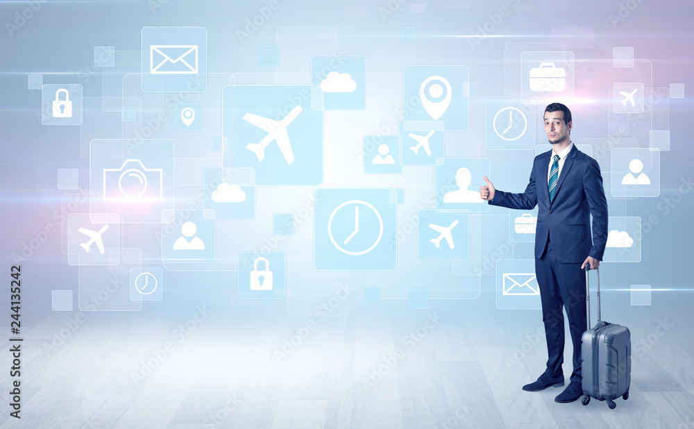 Businessman departs to a business trip with social media and travel symbol concept
Businessman departs to a business trip with social media and travel symbol concept