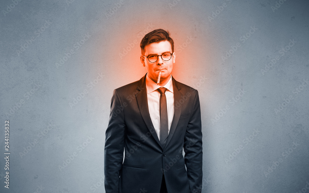 Fever businessman with burning red head concept
Fever businessman with burning red head concept
