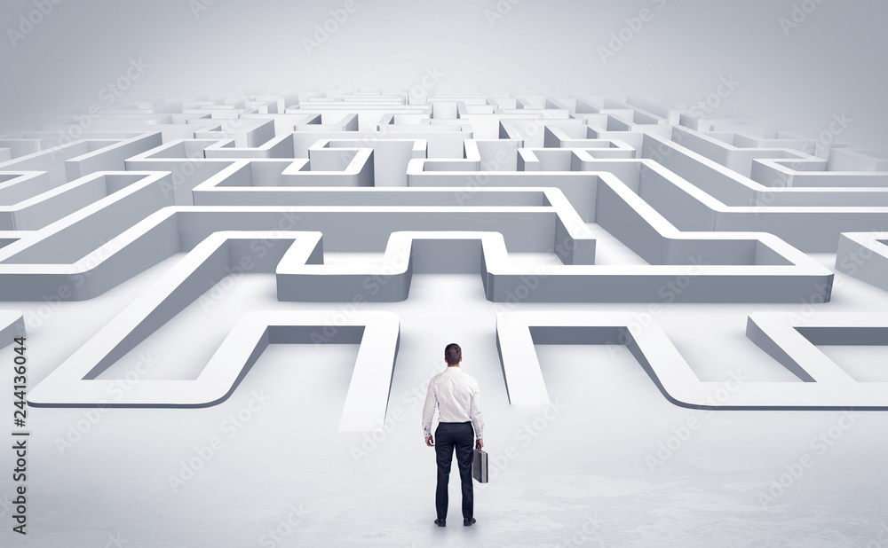 Businessman getting ready to enter a 3D flat labyrinth concept
Businessman getting ready to enter a 3D flat labyrinth concept
