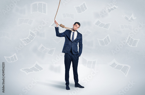 Young burnout businessman with flying documents concept