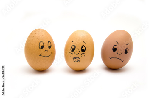 Eggs painted with emotions, psychology, feelings, communication and perception white background