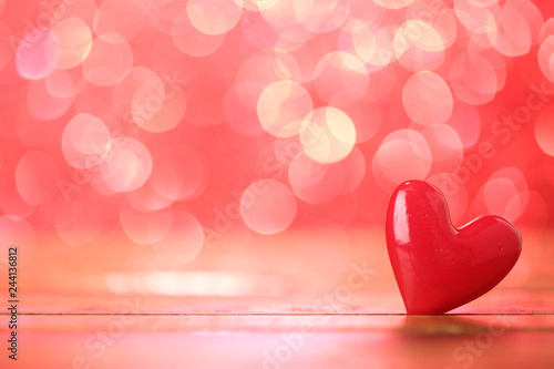 Single heart and red bokeh abstract background