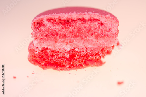 pink macarons on white background