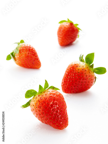 Closeup of strawberries on a white background