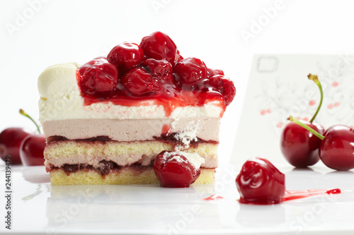 Beautifully designed cherry cake on a white background