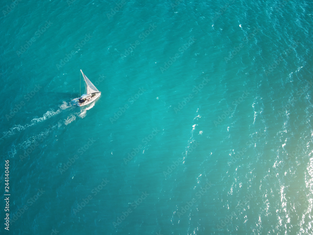 Fototapeta premium Aerial view of yacht in sea.
